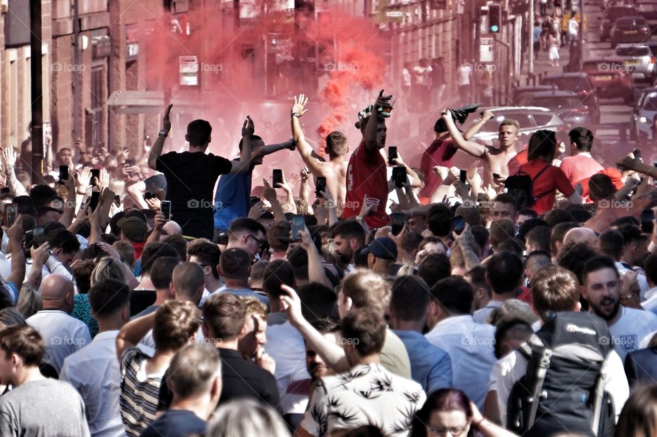 English fans celebrate after win