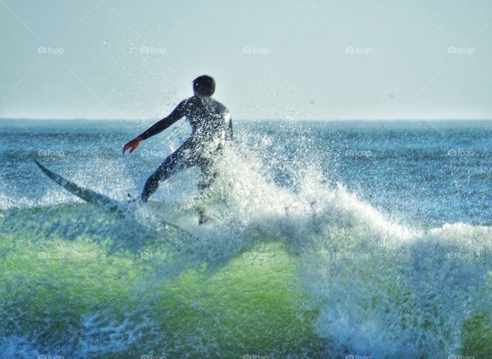 Skilled Surfer Cresting A Big Wave. Big Wave Surfing
