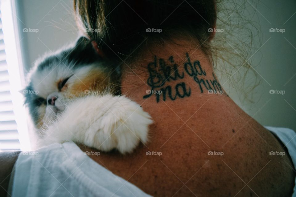 Close-up of a woman with her cat