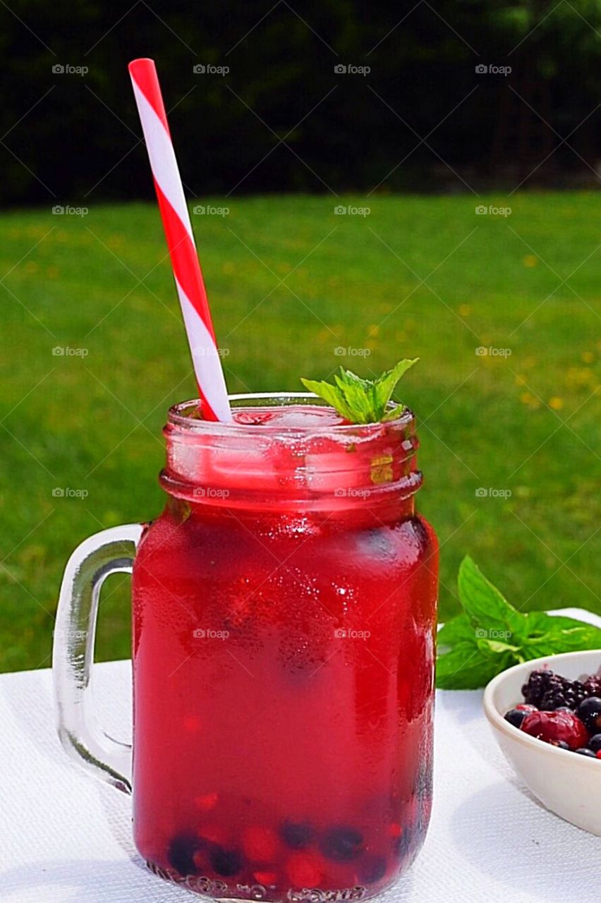 Berry juice with frozen berries and ice