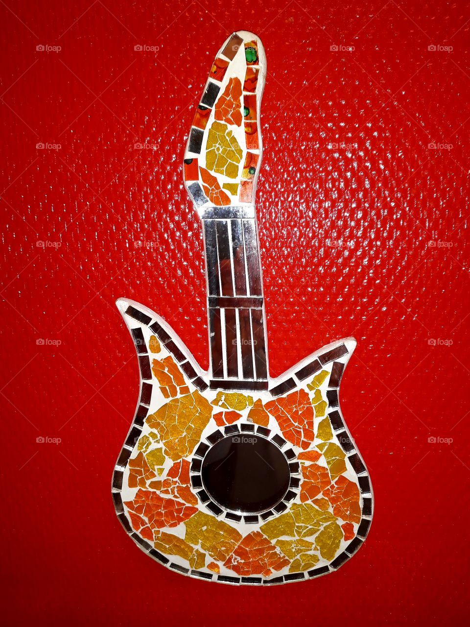 Vintage mirror of a guitar