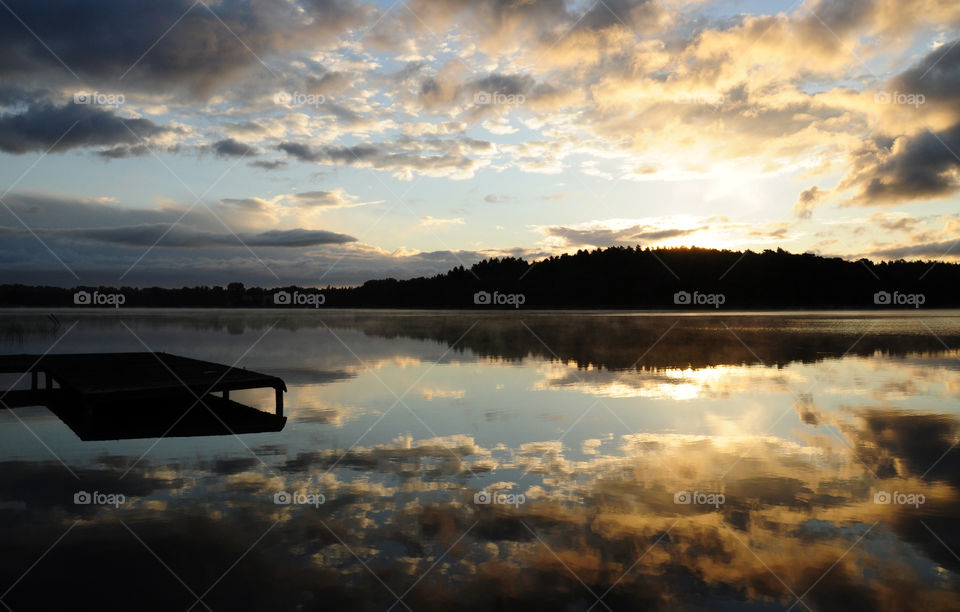 sunrise reflections on the lake in Poland