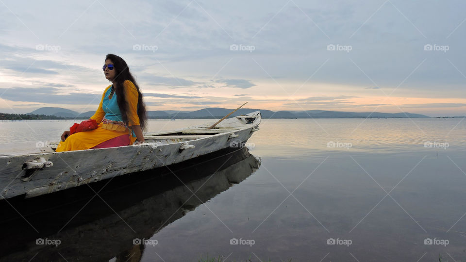 relaxing relaxation riverside boat ride sunset sunrise woman