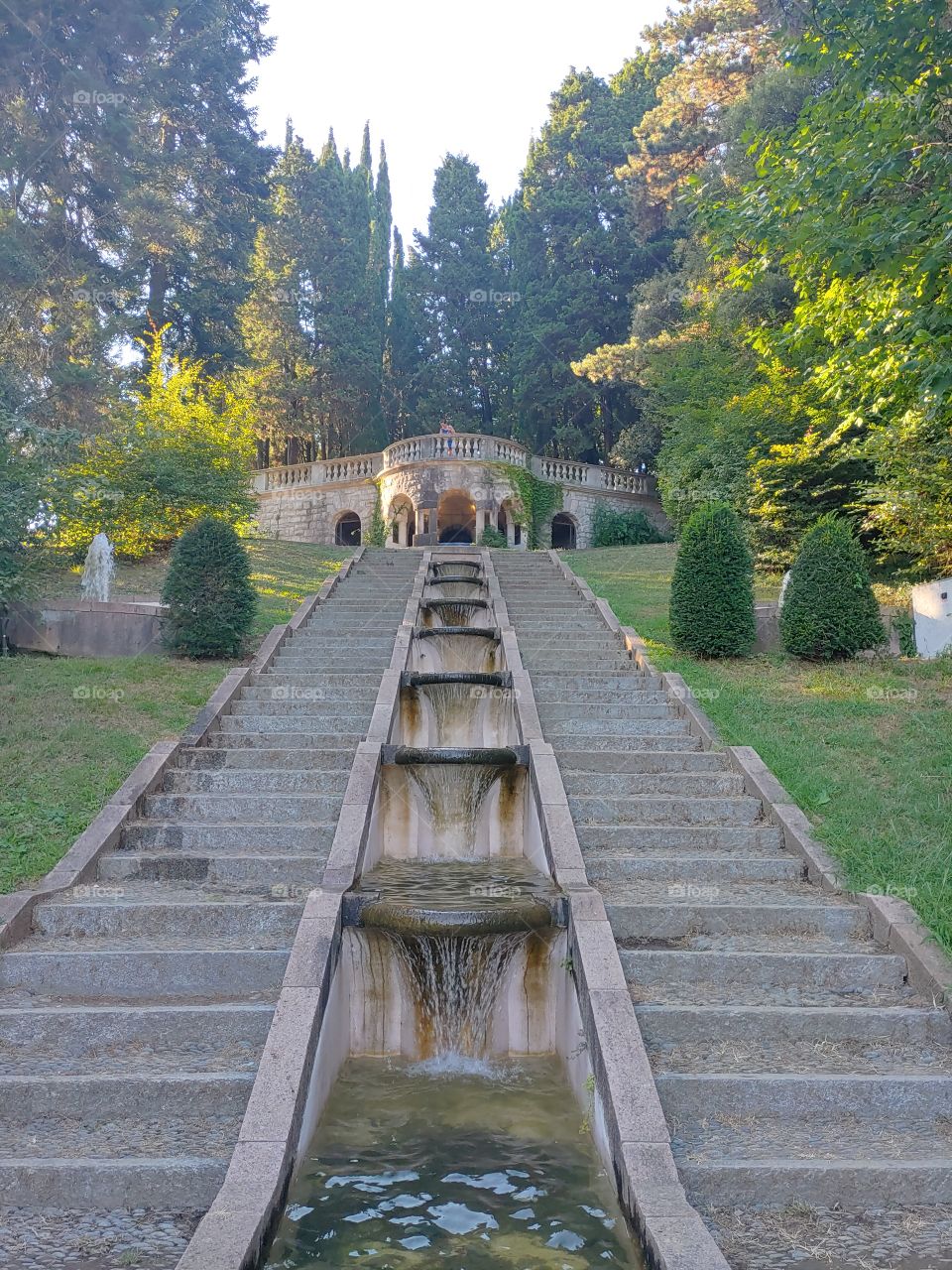 descending waterfalls low perspective, Villa Toepliz's park, Varese, Italy
