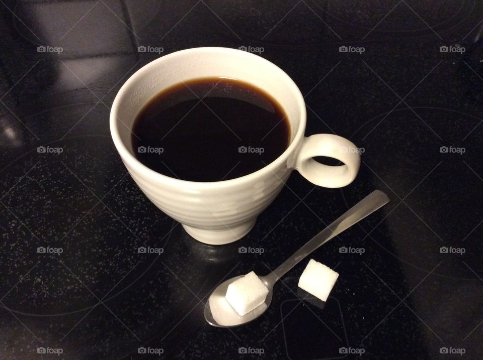 A smooth Cup of coffee with suger.