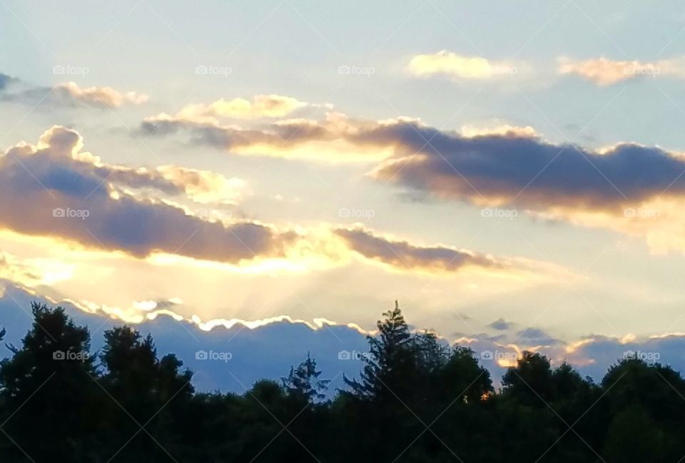 the sky is so pretty at sunset