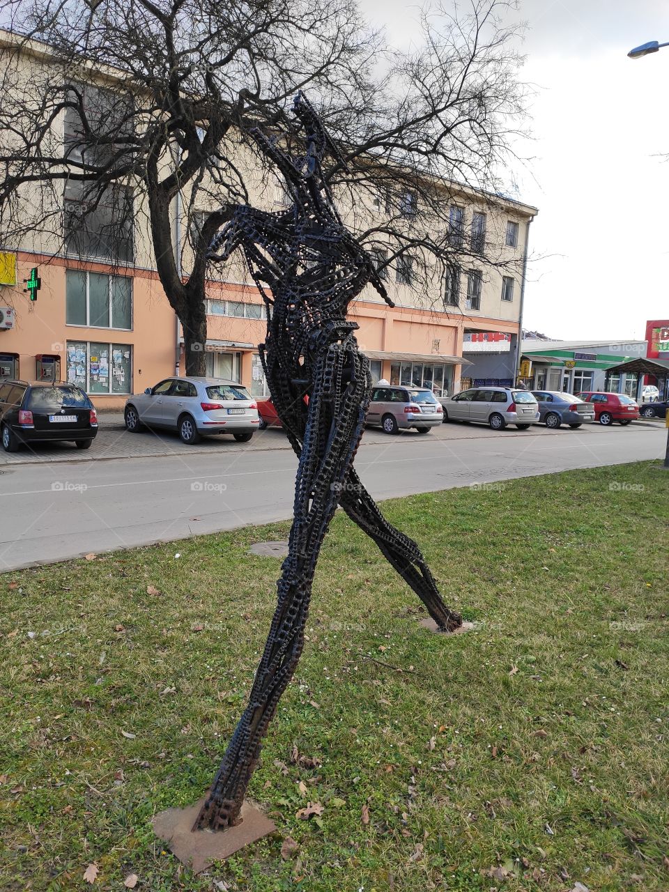 Metallic statue of walker Apatin Serbia