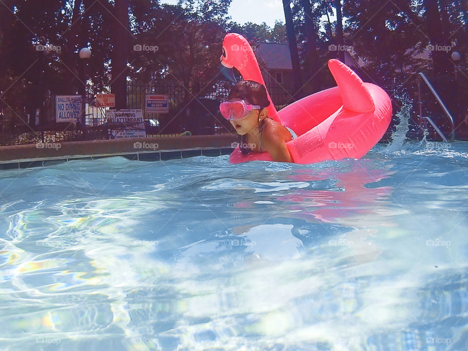 Kid in pool 