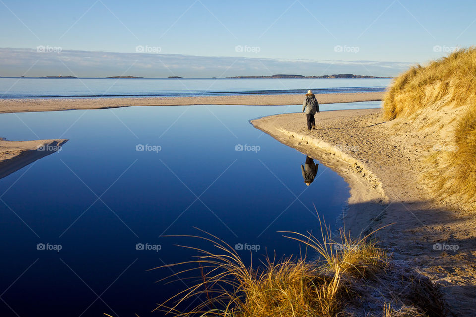 Person walking on beach