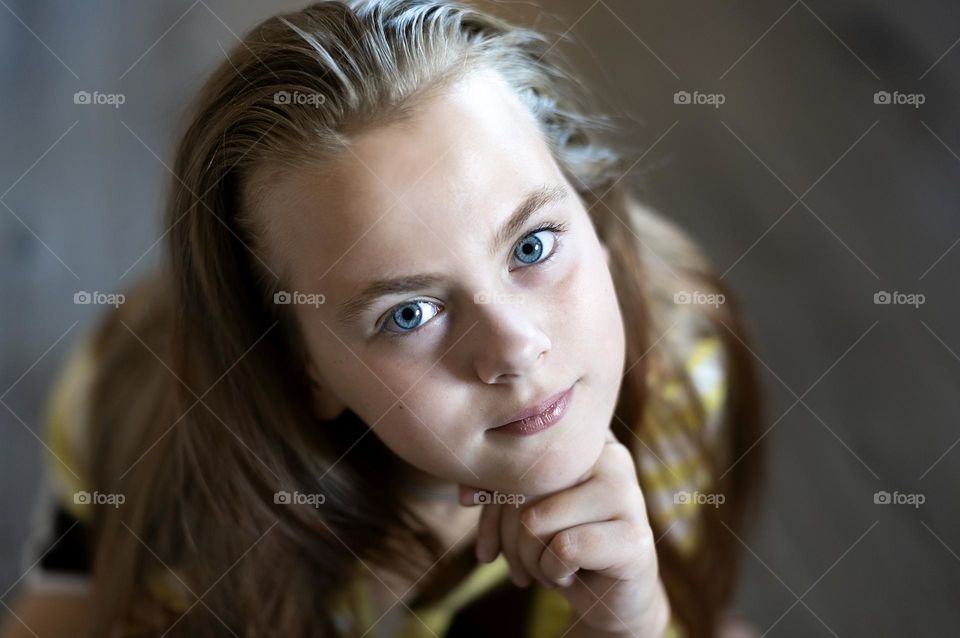 Teenager girl looking at camera