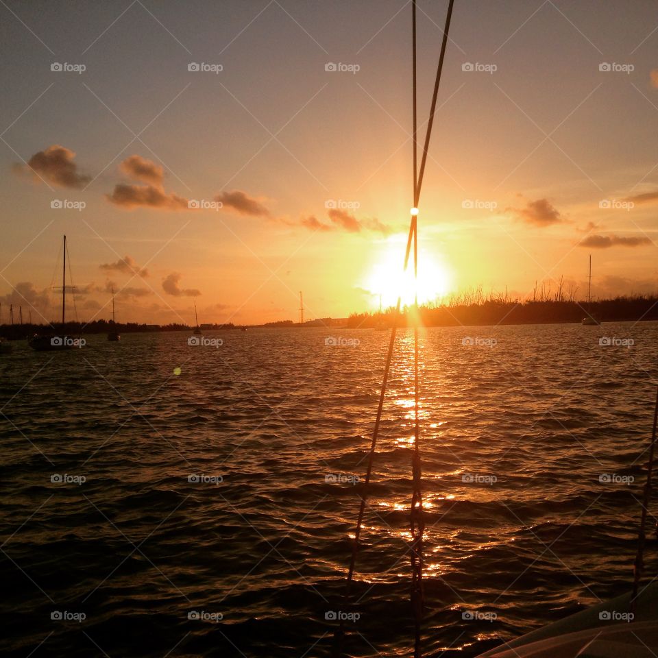 Another sunset in paradise. I'm bored a small sailboat west to Key West by the island