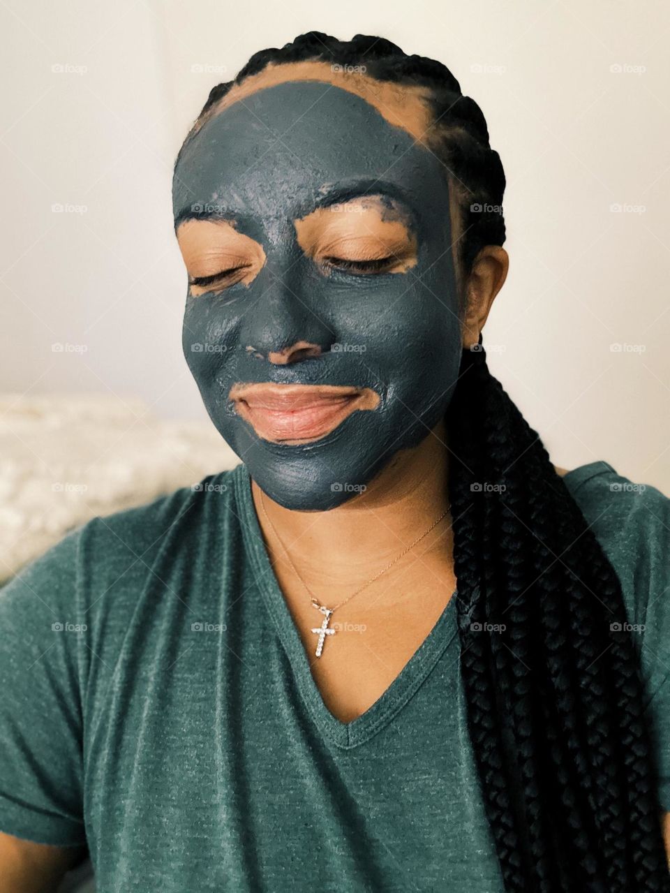 A woman enjoying self care. Today’s self care is a face mask!