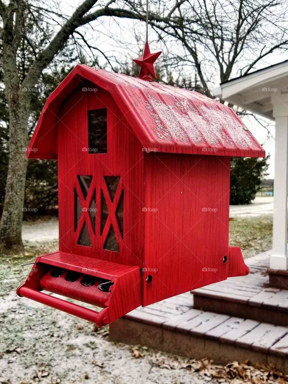 Red Barn Bird Feeder on a Snowy Day