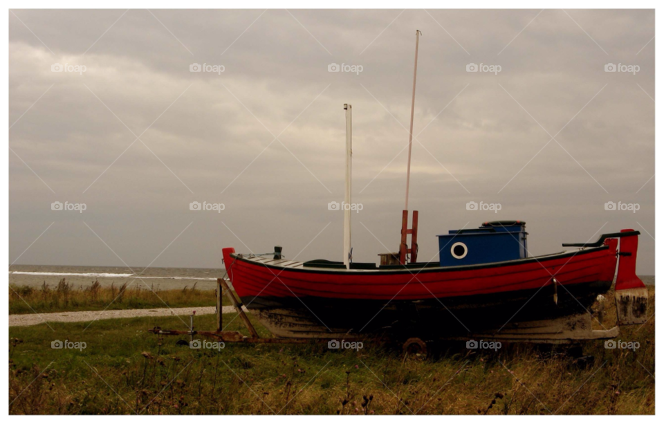gnisvärd sweden autumn boat by rauknrolla