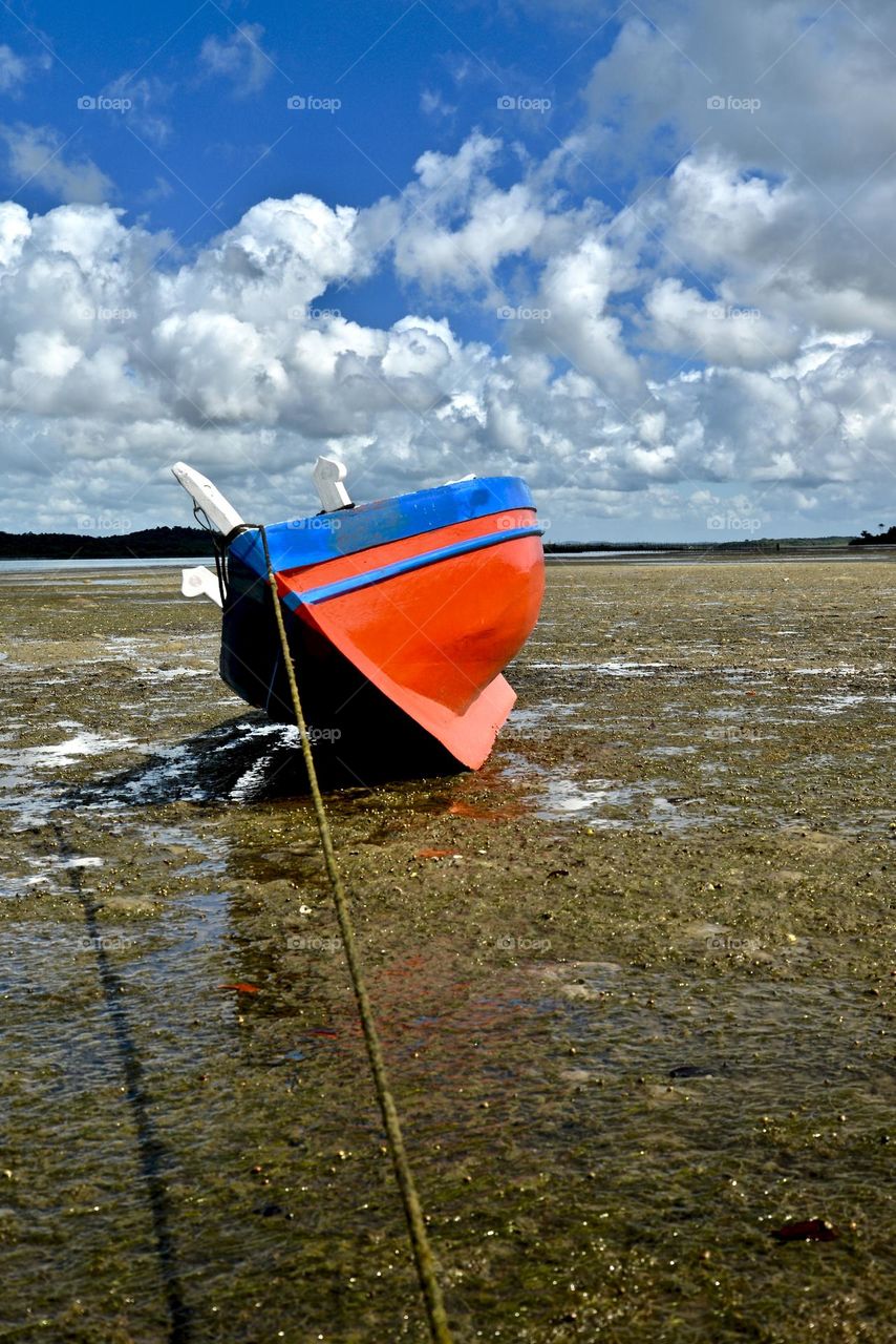 traditional fishing boat moored at Catu beach, Itaparica island, Bahia, Brazil