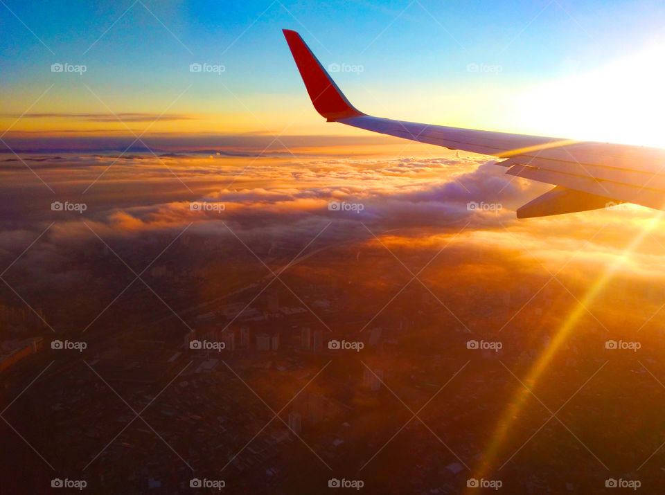 Flying with the Sun raining