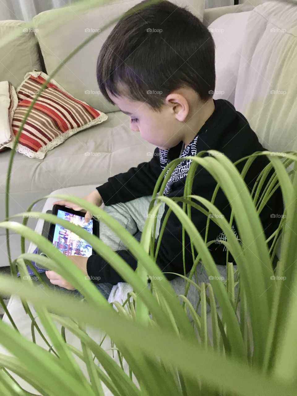 Boy playing video game