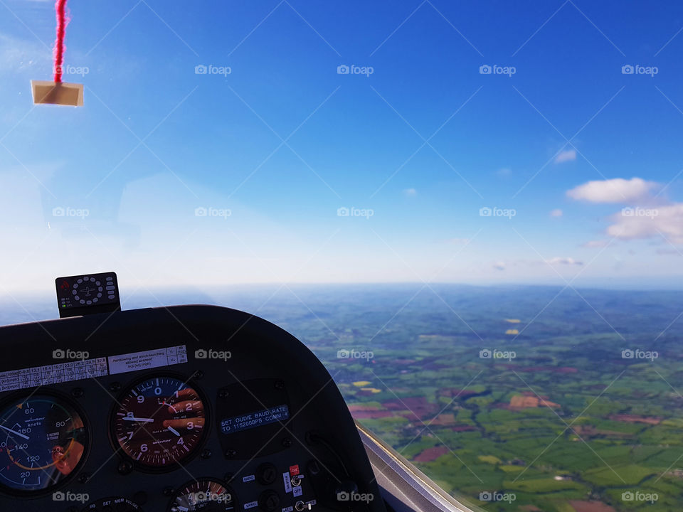 Perkoz flying over East Devon