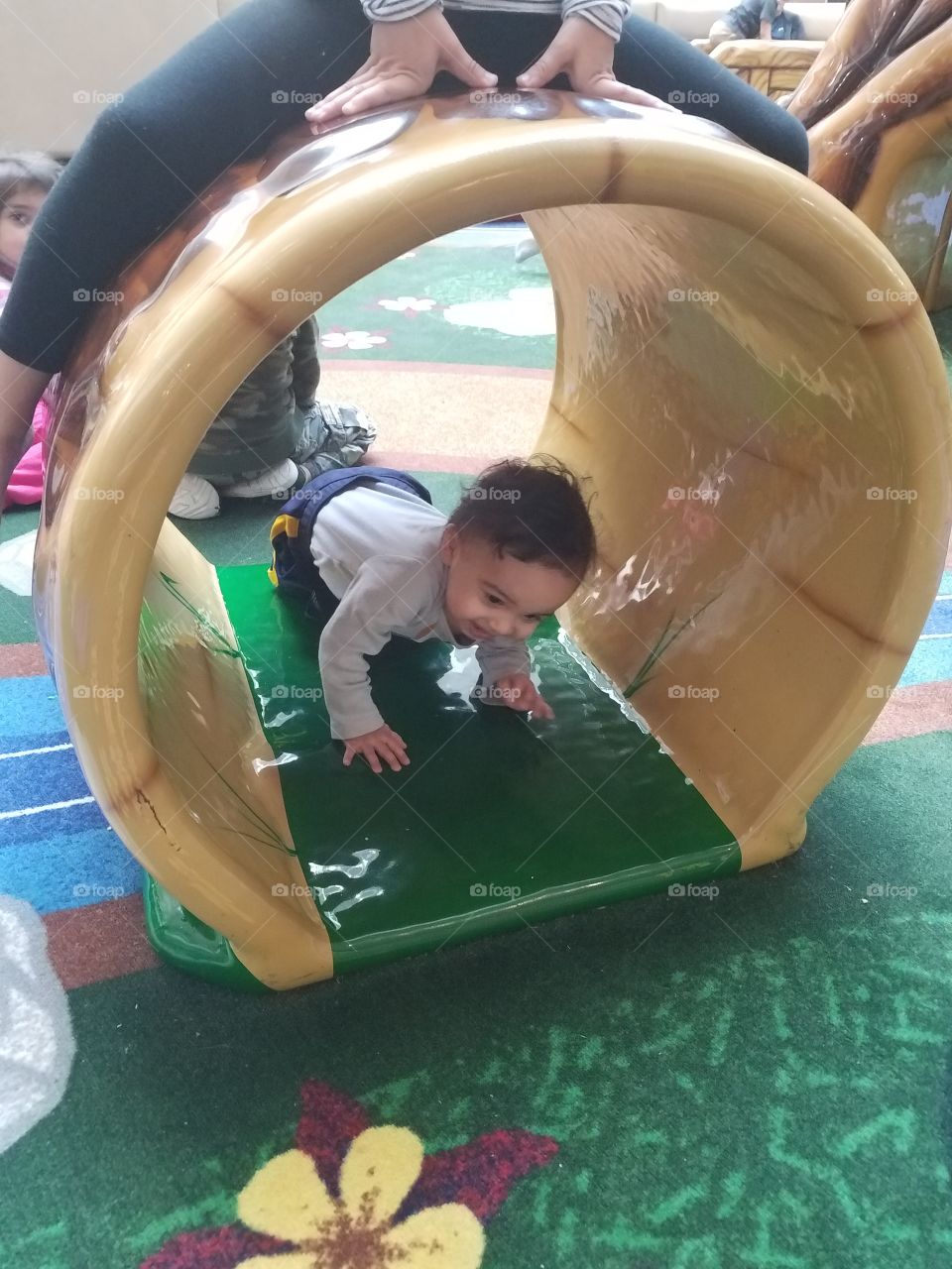 baby boy in tunnel