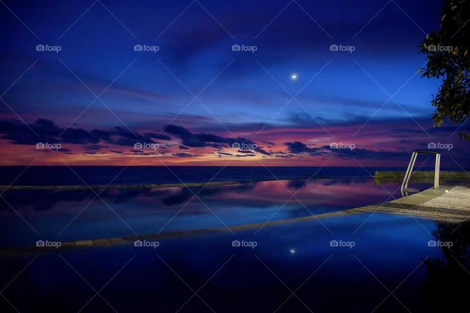 When the sun sets on Parangtritis beach, in a swimming pool by the beach, you can see the blue hour reflection between the sky and the water.
My instagram : @dodhoy_cikuray