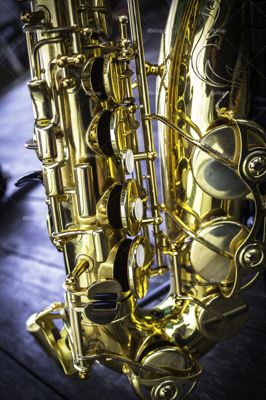 Detail of golden alto saxophone