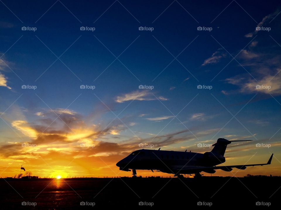 Bombardier CRJ Challenger Charter Jet. Iowa sunset 