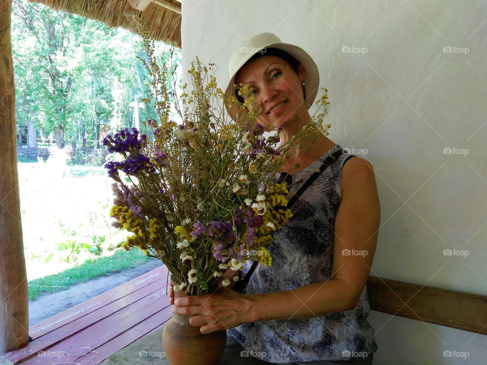 beautiful girl with a bouquet of flowers