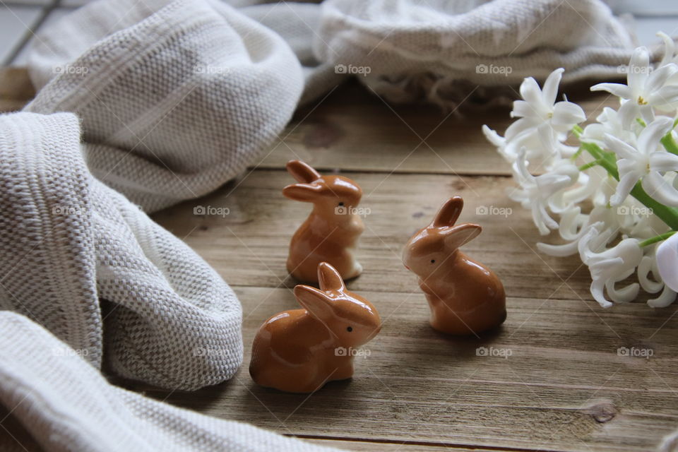 Easter bunny figurines with flowers