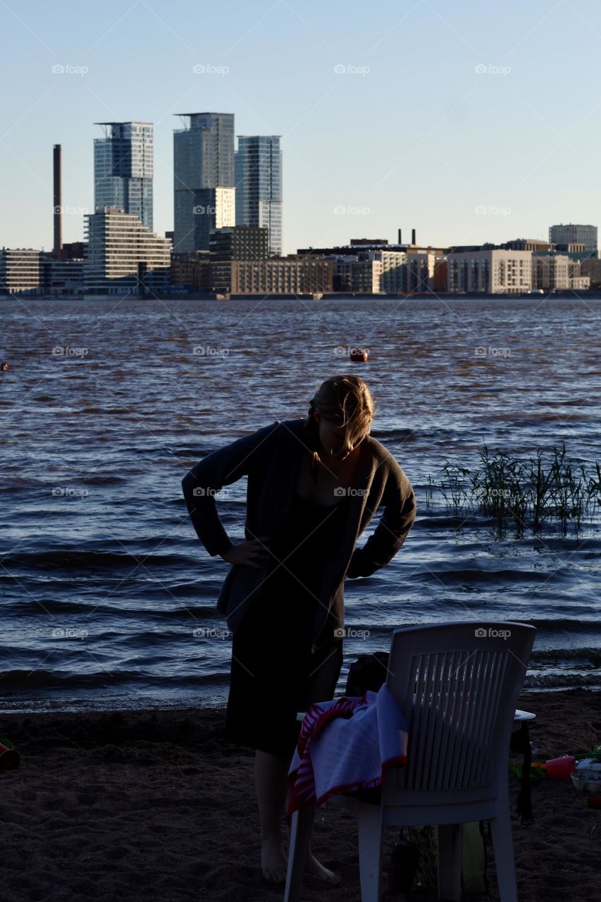 After evening swim at the beach on an island by Helsinki, Finland