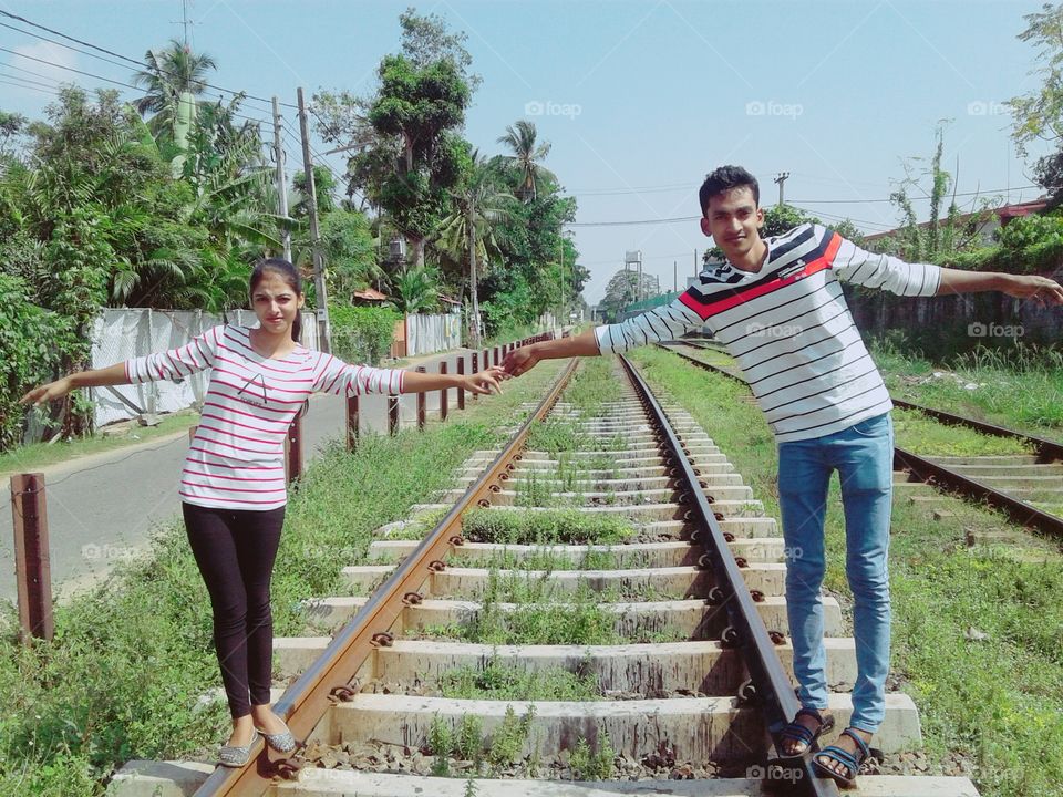 girlfriend and boyfriend on the railway