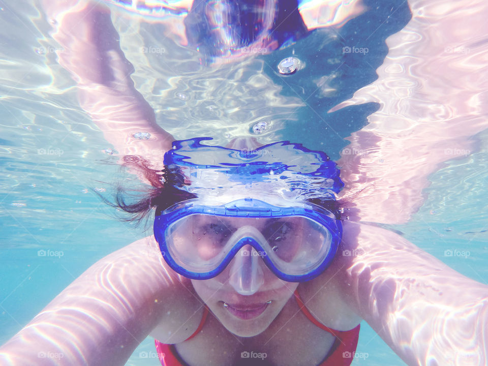 woman under sea level. underwater woman selfie