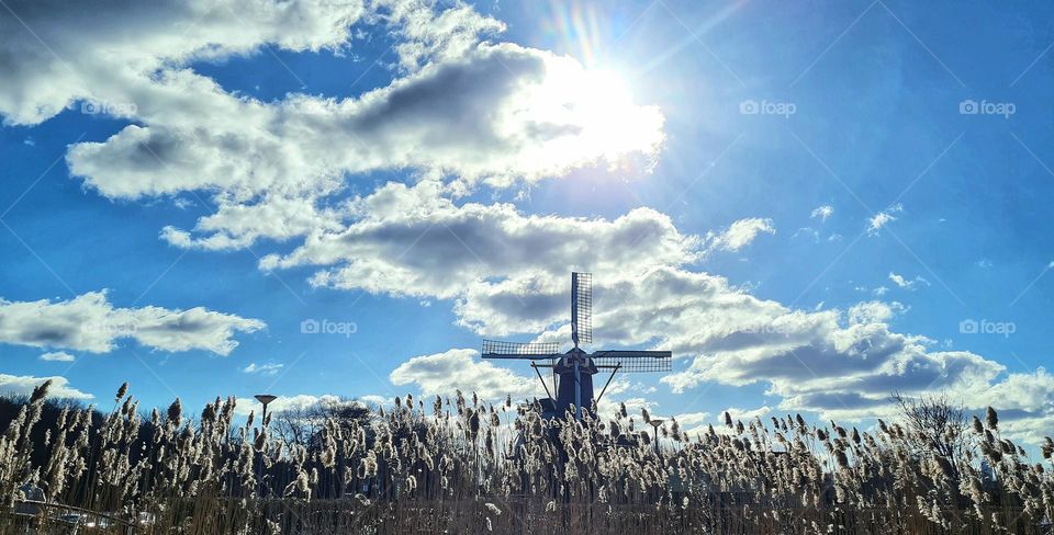 Mill in the sunlight on a sunny cold day