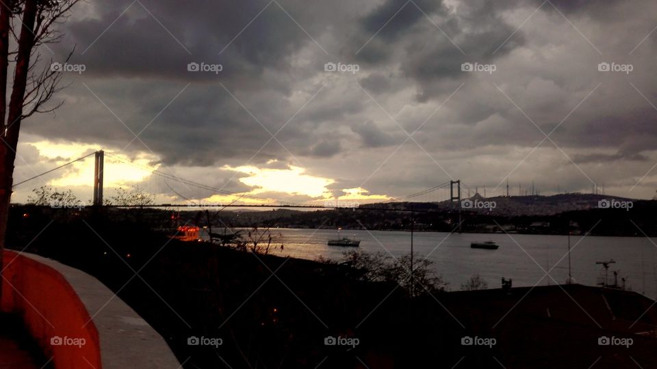 Istanbul is showing sunrise on bridge