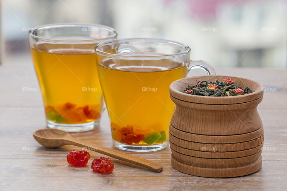 herbal tea in the glass cup on table