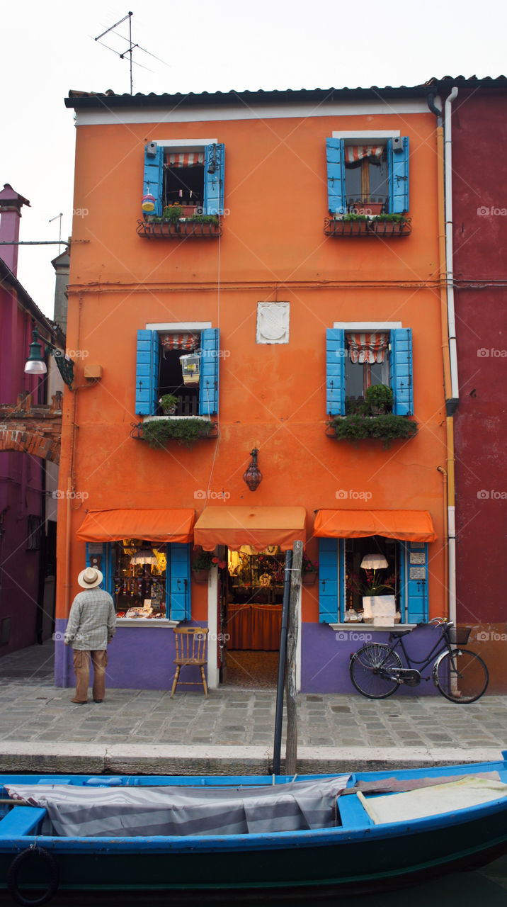 orange house in Burano island near Venice
