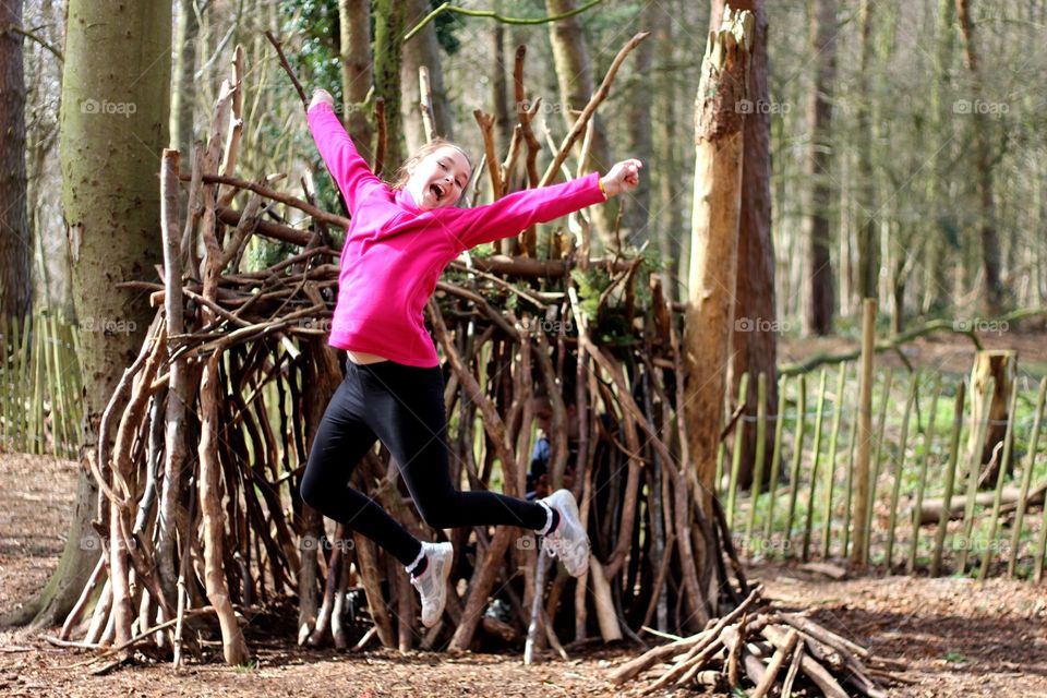 Den building in the woods 