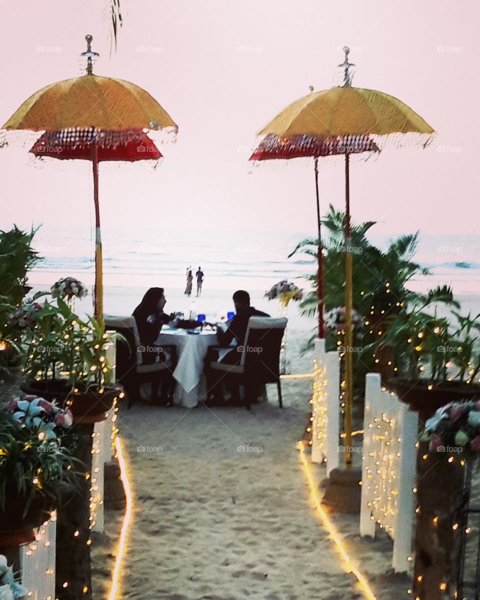 diner  on the beach at Leela Goa