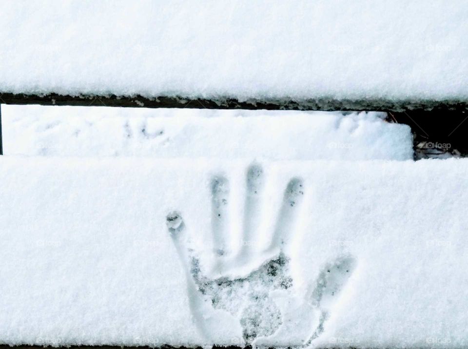 Hand Print in Snowstorm