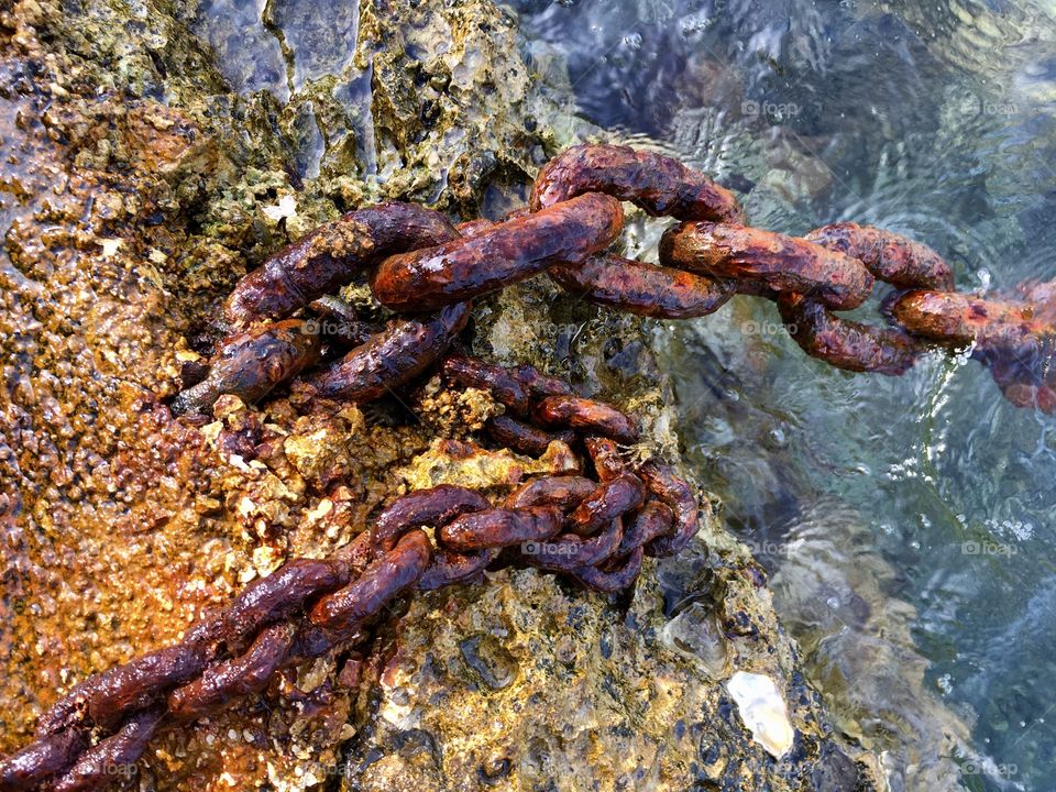 detail of old rusty chains of mooring