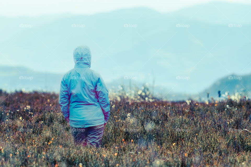 Woman looking at mountains