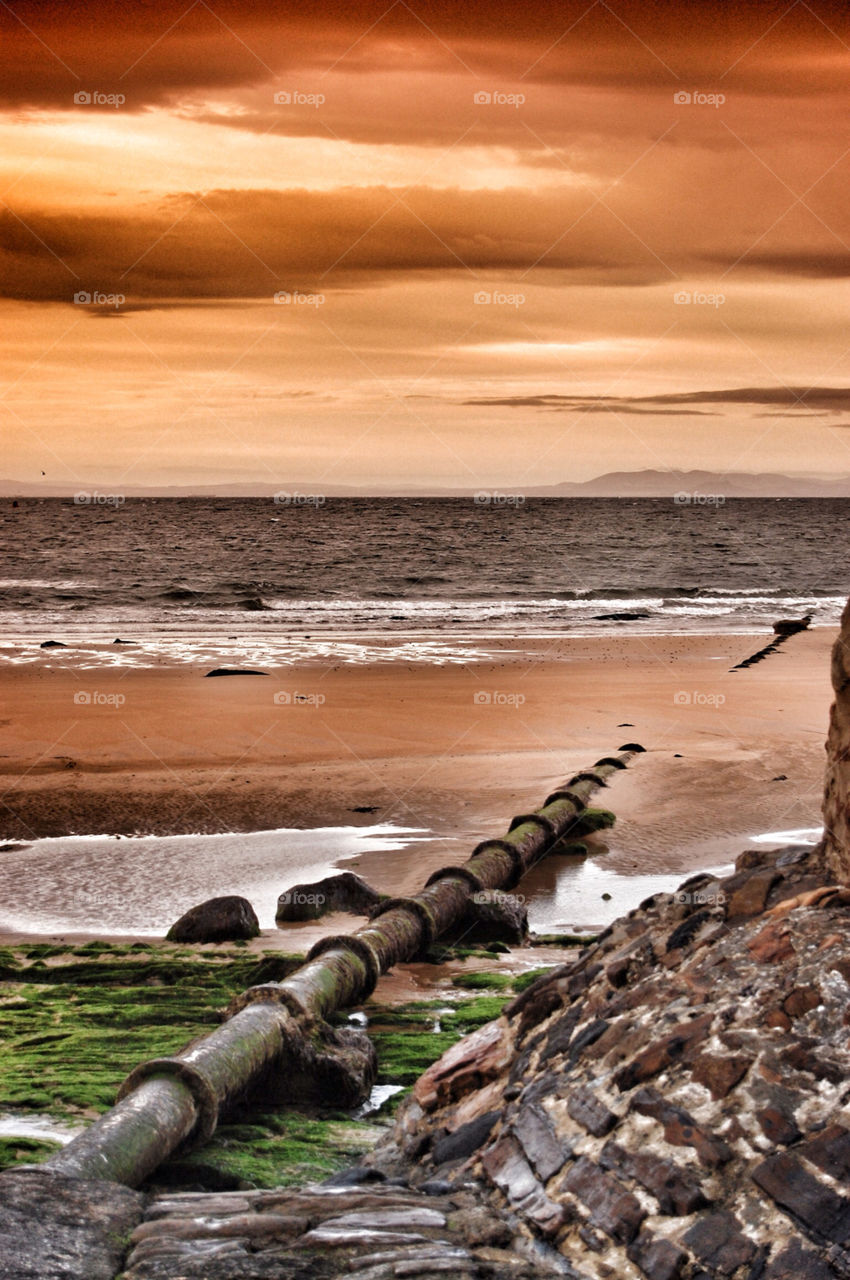 beach sunset sand sea by eddie.kelly.7