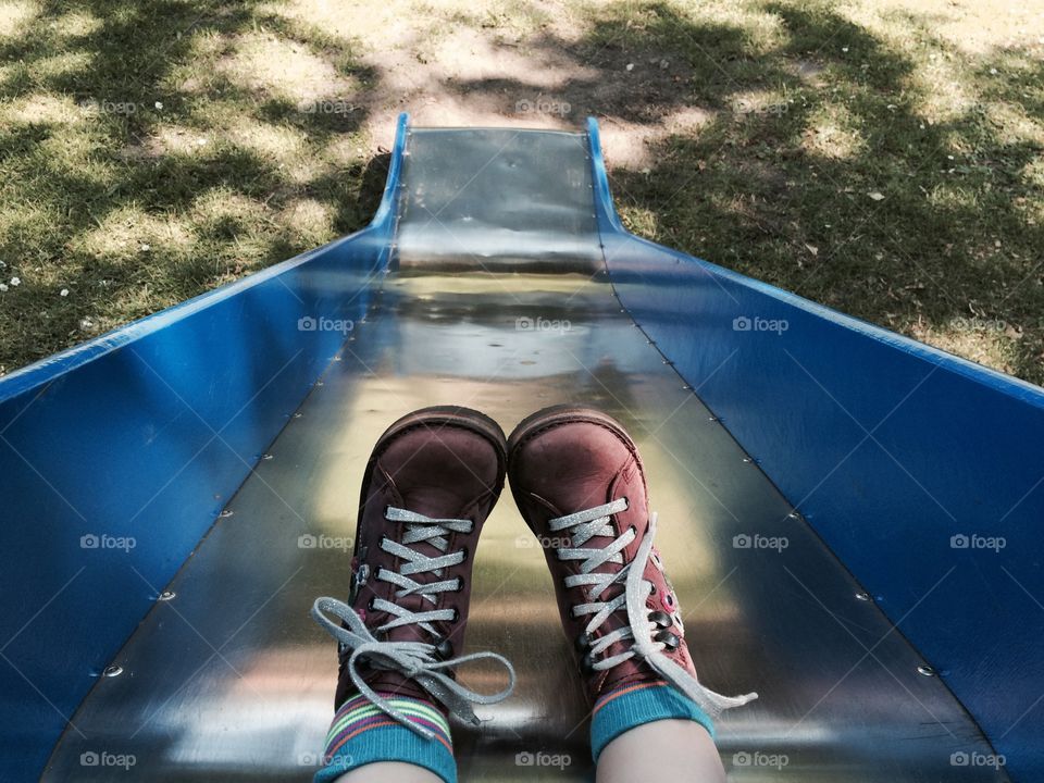 Playtime with a little kid. A slide is always fun when your little. 😎even when you are a adult😃