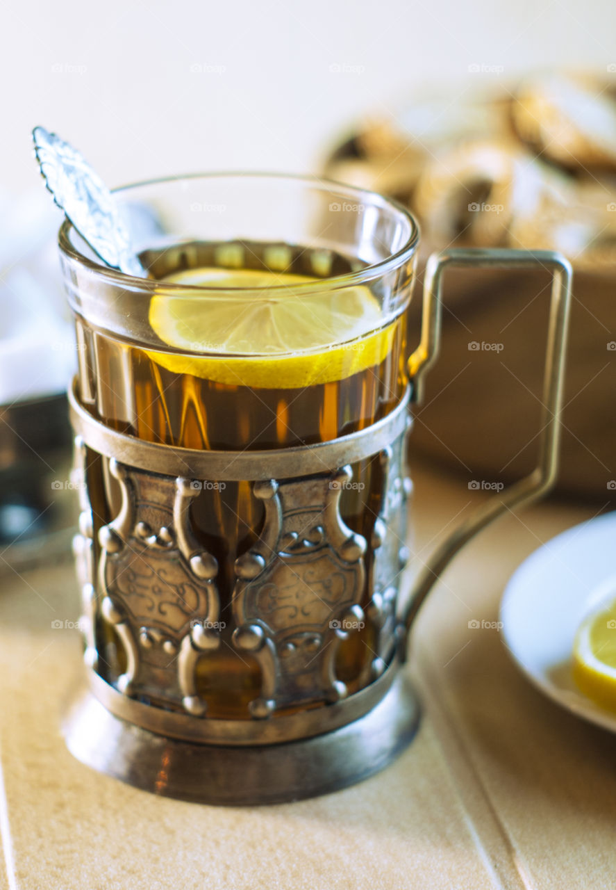 Tea in an old cup holder