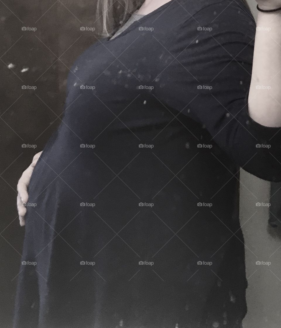 Mommies sacrifice a lot to bring kiddos into the world, but they love their babies! This mama was ready to pop, and she was so excited to meet her little one.