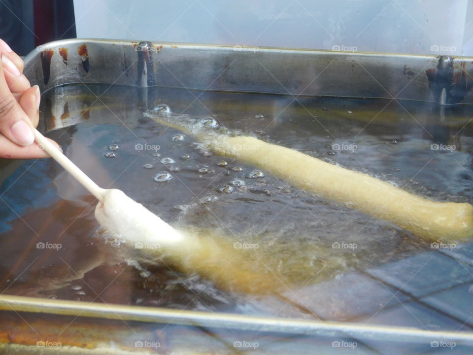 corn dog frying at state fair