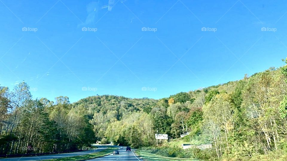 Beautiful mountains cape. Look at how small the cars are!