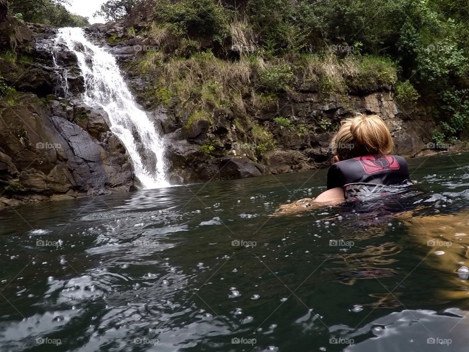 Swimming to the falls 