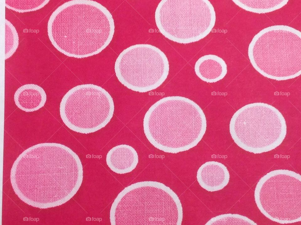 Pink polka dot background.