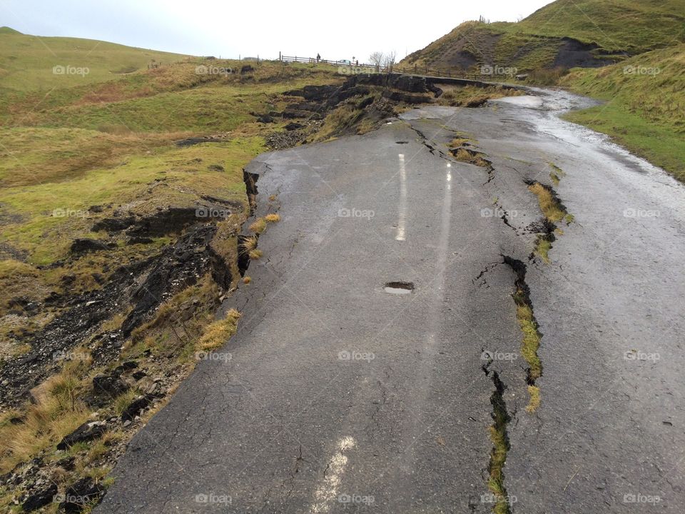 Broken Road. Slow moving landslide destroys a road in the north of England.