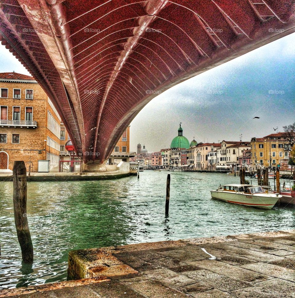 Venice canal under the bridge, Italy